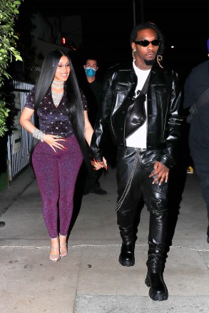 Santa Monica, CA - *EXCLUSIVE* - Cardi B gets an early start celebrating her 29th birthday with husband Offset and family at Giorgio Baldi in Santa Monica. Cardi is very animated as she steps out stunning in an all-purple monochrome look. Pictured: Cardi B, Offset BACKGRID USA OCTOBER 11, 2021 USA: +1 310 798 9111 / usasales@backgrid.com UK: +44 208 344 2007 / uksales@backgrid.com *UK Customers - Images containing children, please pixelate the face before publishing*